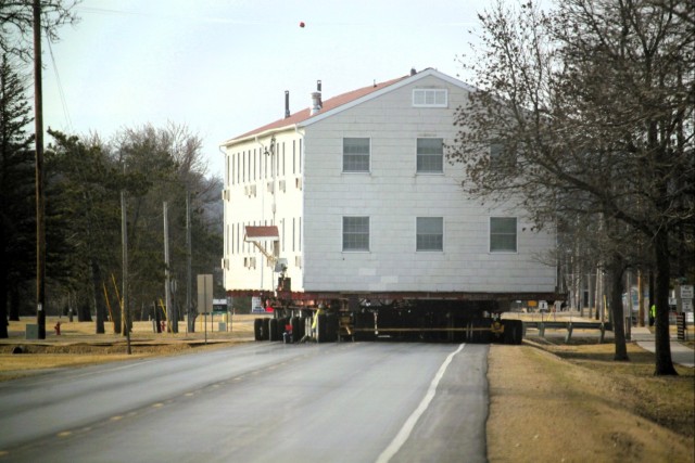 Contractors take advantage of good weather; successfully move third of five World War II-era barracks at Fort McCoy