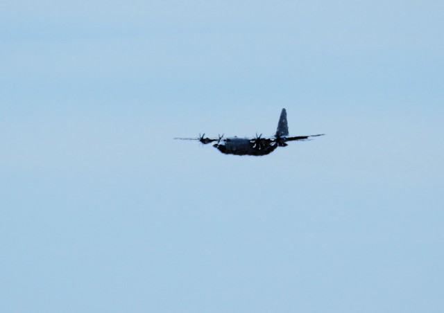 A C-130 Hercules aircraft flies over South Post on March 13, 2025, at Fort McCoy, Wis., as part of training operations. The C-130 Hercules primarily performs the tactical portion of the U.S. Air Force&#39;s airlift mission, and Air National Guard...