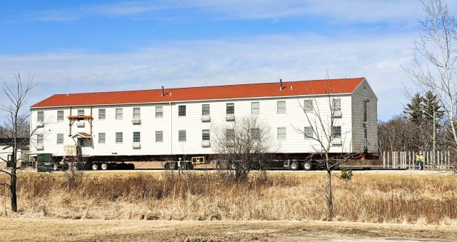 Contractors take advantage of good weather; successfully move third of five World War II-era barracks at Fort McCoy