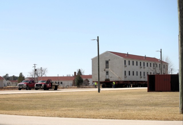 Contractors take advantage of good weather; successfully move third of five World War II-era barracks at Fort McCoy