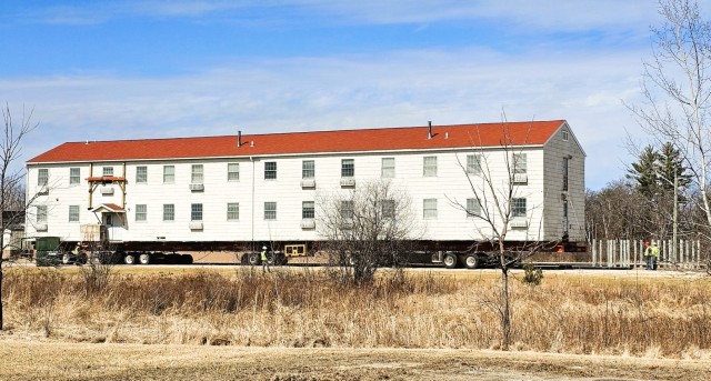 Contractors take advantage of good weather; successfully move third of five World War II-era barracks at Fort McCoy