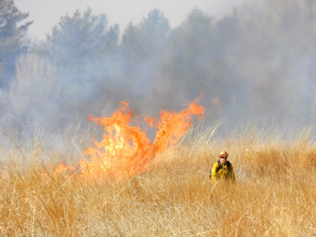 Members of the Fort McCoy prescribed burn team oversee a prescribed burn March 13, 2025, on South Post at Fort McCoy, Wis. The post prescribed burn team includes personnel with the Fort McCoy Directorate of Emergency Services Fire Department;...