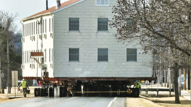 Contractors take advantage of good weather; successfully move third of five World War II-era barracks at Fort McCoy