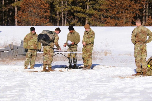 ROTC cadets with an Army ROTC unit participate in the Northern Warfare Challenge on Feb. 21, 2025, at Fort McCoy, Wis. There were 54 teams competing in the challenge from universities and colleges all over the United States. At Fort McCoy, cadets...