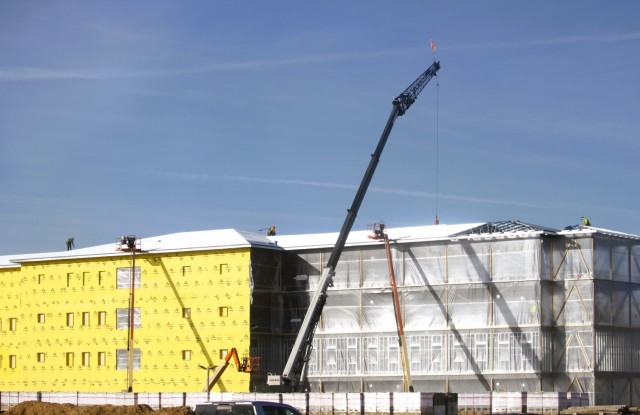 Contractors work on a new $27.3 million transient training troops barracks project, known as the Fort McCoy East Barracks Project, on March 12, 2025, at Fort McCoy, Wis. Contractors began in May 2024 getting the site set up for the fourth...