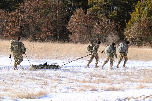 ROTC cadets compete in the Northern Warfare Challenge on Feb. 21, 2025, at Fort McCoy, Wis. ROTC teams with U.S. Army Cadet Command came from all around the United States as they battled through a wide variety of challenges and long ruck marching...