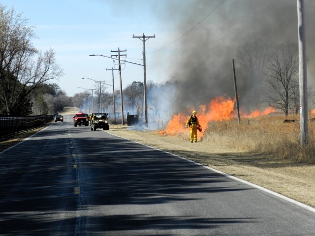 Members of the Fort McCoy prescribed burn team oversee a prescribed burn March 13, 2025, on South Post at Fort McCoy, Wis. The post prescribed burn team includes personnel with the Fort McCoy Directorate of Emergency Services Fire Department;...
