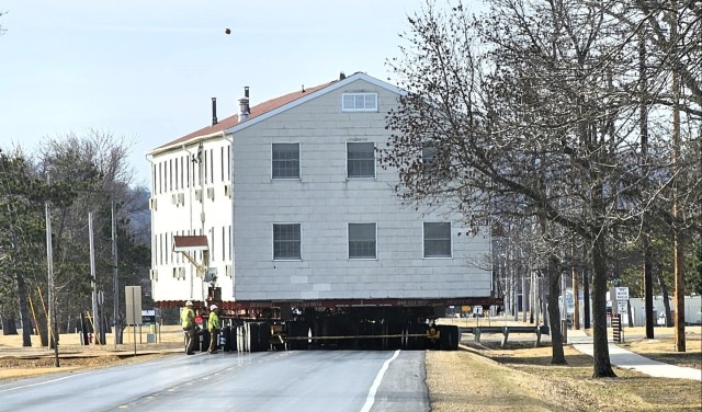 Contractors take advantage of good weather; successfully move third of five World War II-era barracks at Fort McCoy
