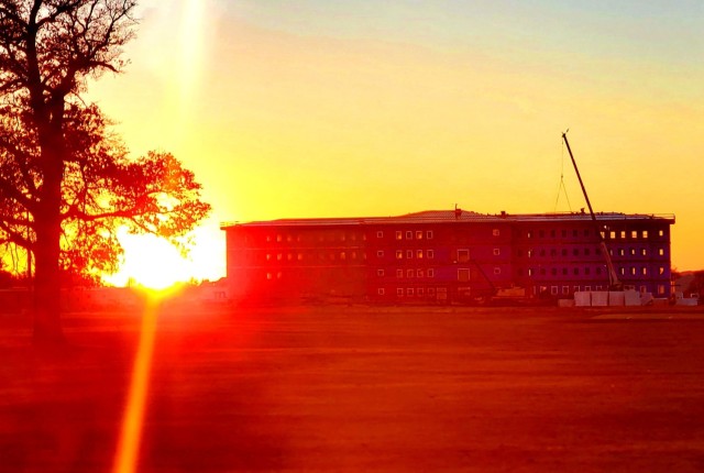 An area of the 1600 block of the cantonment area of the installation is shown Dec. 2, 2020, at sunset as a new multi-million dollar transient troop training barracks is being built at Fort McCoy, Wis. Contractor L.S. Black Constructors was awarded...