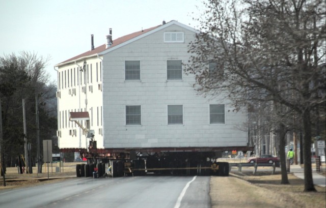 Contractors take advantage of good weather; successfully move third of five World War II-era barracks at Fort McCoy