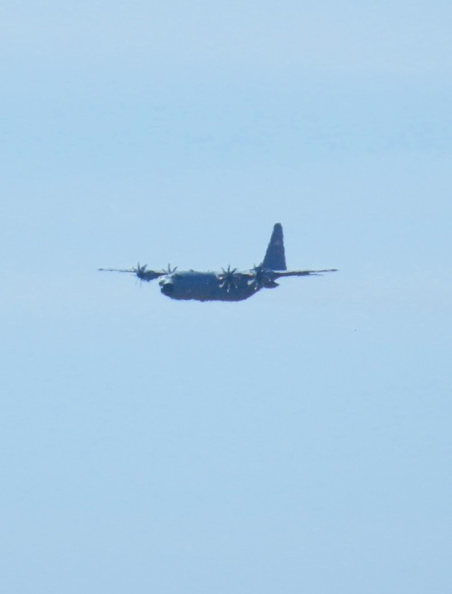 A C-130 Hercules aircraft flies over South Post on March 13, 2025, at Fort McCoy, Wis., as part of training operations. The C-130 Hercules primarily performs the tactical portion of the U.S. Air Force&#39;s airlift mission, and Air National Guard...