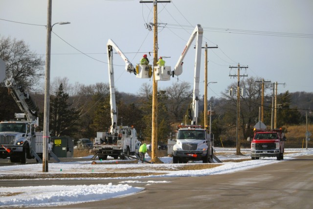 Contractors work on power lines Feb. 10, 2025, on the cantonment area at Fort McCoy, Wis. The work is part of an ongoing electrical grid upgrade at the installation where the post will go from a from a Delta Electrical System to a Wye Electrical...