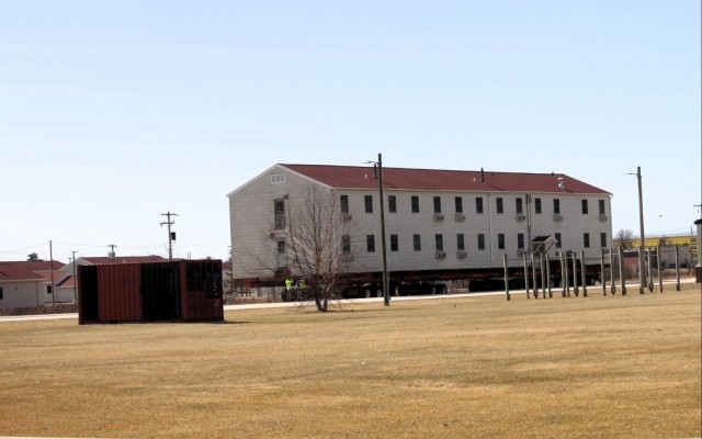 Contractors take advantage of good weather; successfully move third of five World War II-era barracks at Fort McCoy