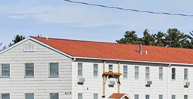 Contractors take advantage of good weather; successfully move third of five World War II-era barracks at Fort McCoy