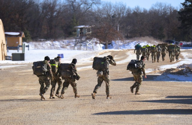 ROTC cadets compete in the Northern Warfare Challenge on Feb. 21, 2025, at Fort McCoy, Wis. ROTC teams with U.S. Army Cadet Command came from all around the United States as they battled through a wide variety of challenges and long ruck marching...