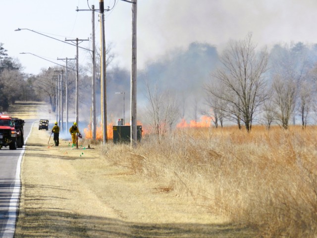 Members of the Fort McCoy prescribed burn team oversee a prescribed burn March 13, 2025, on South Post at Fort McCoy, Wis. The post prescribed burn team includes personnel with the Fort McCoy Directorate of Emergency Services Fire Department;...