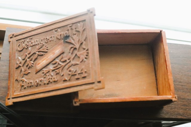 A small, wooden keepsake box adorned with carvings and the inscription, “Gefangenschaft Amerika 1944,” is shown Feb. 12, 2025, at Fort McCoy, Wis. The box was donated in late January 2025 to the Fort McCoy Public Affairs Office for inclusion...