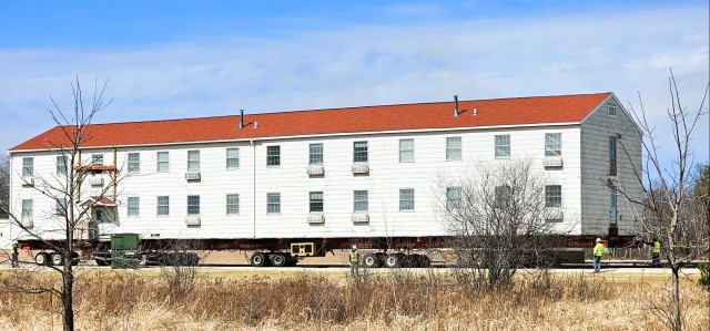 Contractors take advantage of good weather; successfully move third of five World War II-era barracks at Fort McCoy