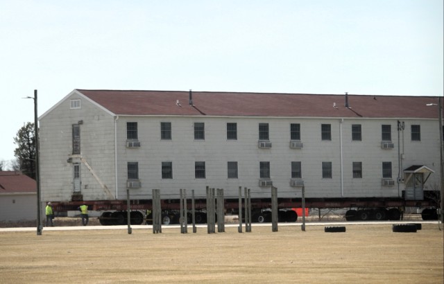 Contractors take advantage of good weather; successfully move third of five World War II-era barracks at Fort McCoy
