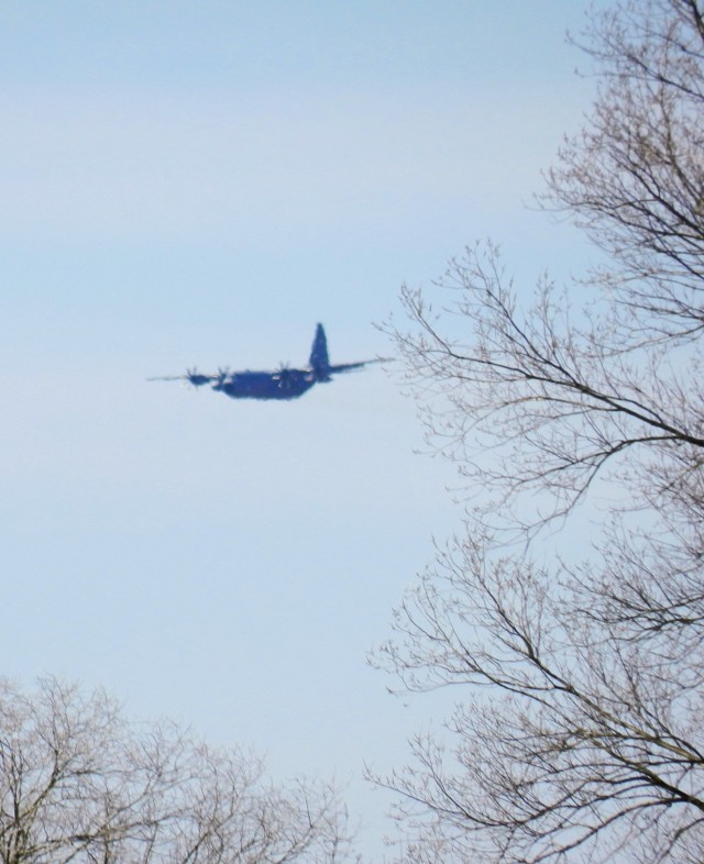 A C-130 Hercules aircraft flies over South Post on March 13, 2025, at Fort McCoy, Wis., as part of training operations. The C-130 Hercules primarily performs the tactical portion of the U.S. Air Force&#39;s airlift mission, and Air National Guard...