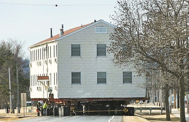 Contractors take advantage of good weather; successfully move third of five World War II-era barracks at Fort McCoy