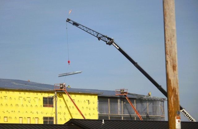 Contractors work on a new $27.3 million transient training troops barracks project, known as the Fort McCoy East Barracks Project, on March 12, 2025, at Fort McCoy, Wis. Contractors began in May 2024 getting the site set up for the fourth...