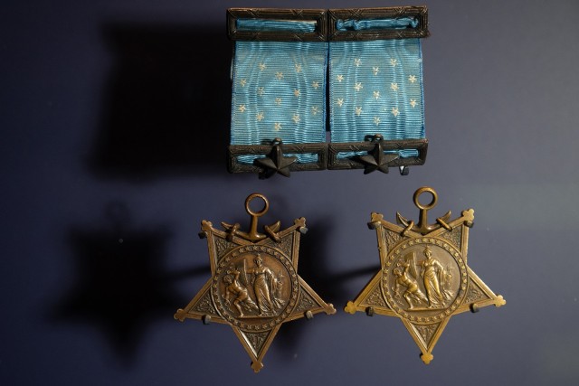 A pair of Medals of Honor are on display at the National Medal of Honor Museum in Arlington, Texas, on March 6, 2025. Only 19 people have become double recipients of the Medal of Honor. (DoD photo by EJ Hersom)