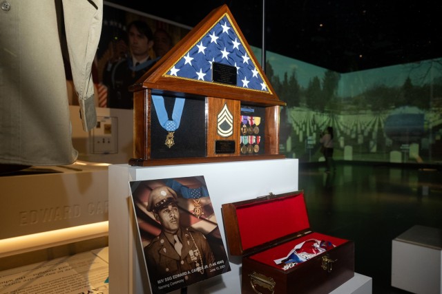 The shadow box of Army Staff Sgt. Edward A. Carter is on display at the National Medal of Honor Museum in Arlington, Texas, on March 6, 2025. (DoD photo by EJ Hersom)