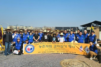 We Grow Together - Camp Humphreys community builds bonds by planting potatoes