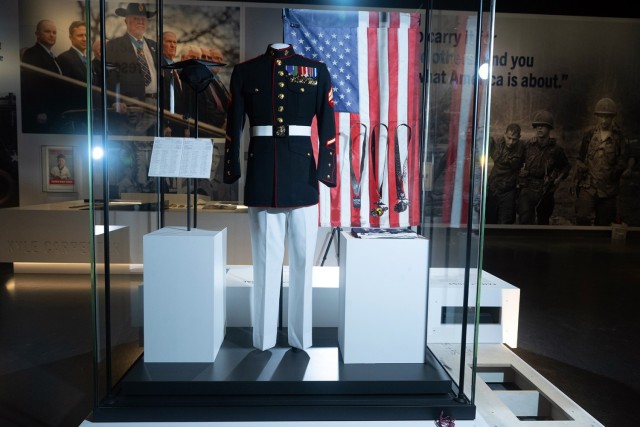 The uniform belonging to Medal of Honor recipient U.S. Marine Corps Cpl. Kyle Carpenter is on display at the Medal of Honor Museum in Arlington, Texas, on March 6, 2025. (DoD photo by EJ Hersom)