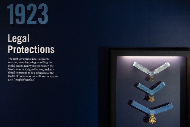 Medals of Honor on display are accompanied by a statement warning of legal repercussions for stolen valor at the National Medal of Honor Museum in Arlington, Texas, on March 6, 2025. (DoD photo by EJ Hersom)