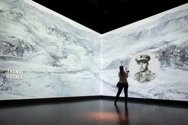 An interactive video panel portrays battles and the Medal of Honor recipients who fought in them at the National Medal of Honor Museum in Arlington, Texas, on March 6, 2025. (DoD photo by EJ Hersom)