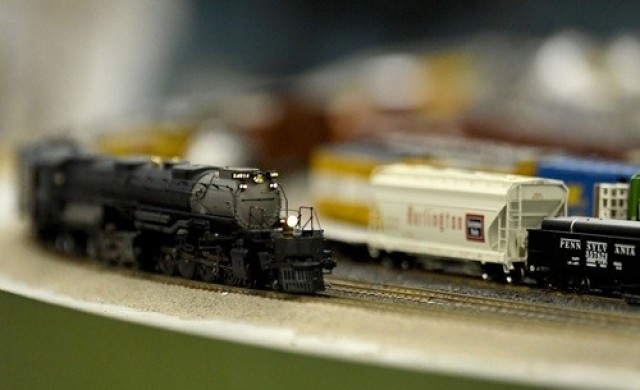 An HO scale model of a locomotive runs on the tracks at the Redstone Model Railroad Club on March 18.
