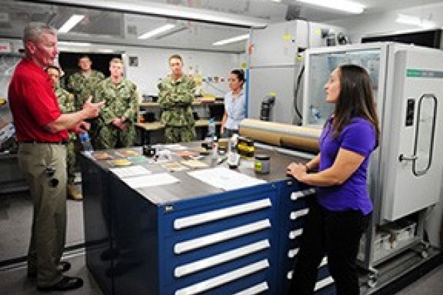 140321-N-FJ200-027 NAVAL SUPPORT ACTIVITY BAHRAIN (Mar. 21, 2014) – LT. Gen. John A. Toolan Jr. (left), commanding general, I Marine Expeditionary Force, speaks with Explosive Ordnance Disposal (EOD) Technicians and assigned laboratory...