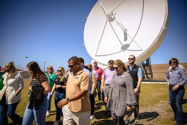 Chamber of Commerce leadership program members tour the Signal Schoolhouse at Fort Eisenhower during the annual Military Day, gaining insights into the Army’s advanced communication systems and training programs.