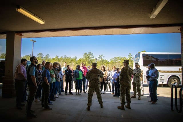 Chamber of Commerce leadership program participants arrive at Clayton Barracks and receive a briefing from leaders of the 551st Signal Battalion on life for new Soldiers during advanced individual training at Clayton Barracks, Fort Eisenhower,...