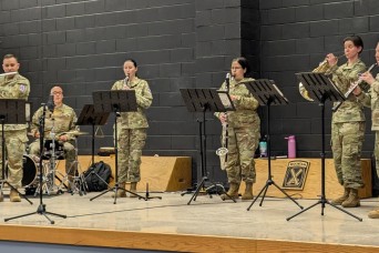 10th Mountain Division Band entertains, educates Fort Drum students in support of Music in Our Schools