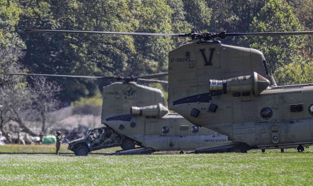 Soldiers offload Infantry Squad Vehicles at the start of hurricane relief efforts. (Photo courtesy of the 101st Airborne Division Public Affairs Office)