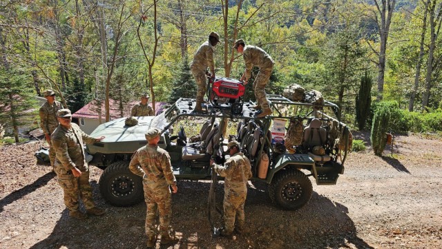 Soldiers assigned to 2-502 IN deliver a generator to an isolated citizen during Hurricane Helene relieve efforts in Brunsville, NC, on 10 October 2024.