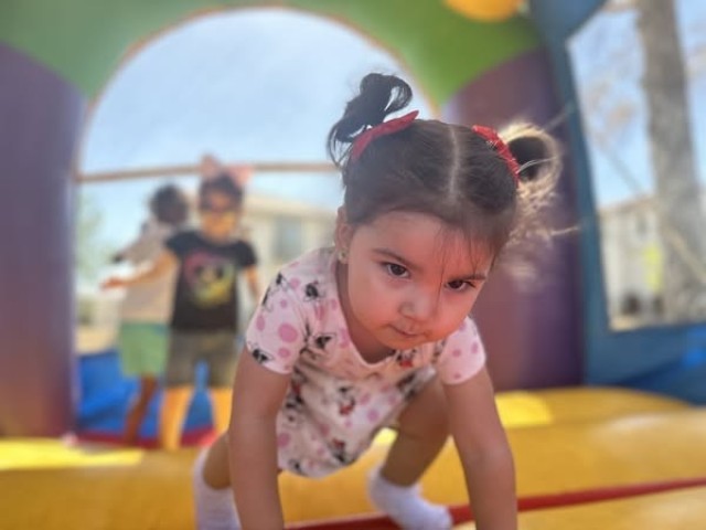 She handles the Bouncy House Like A Boss!
(U.S. Army photo by James Williams III)