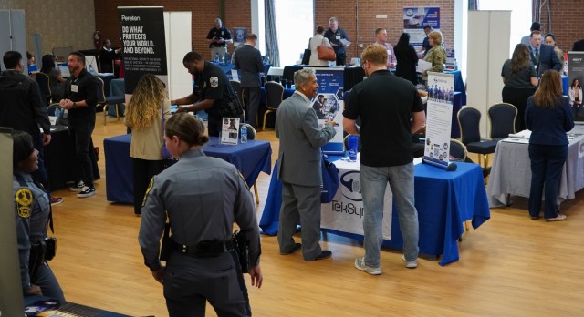 Veterans, service members and spouses gather at Joint Base Myer-Henderson Hall for a hiring event March 20, 2025. Transitioning service members gained valuable resources for their entry into the civilian workforce.