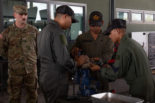 Members of the Royal Thai Army, assigned to
...