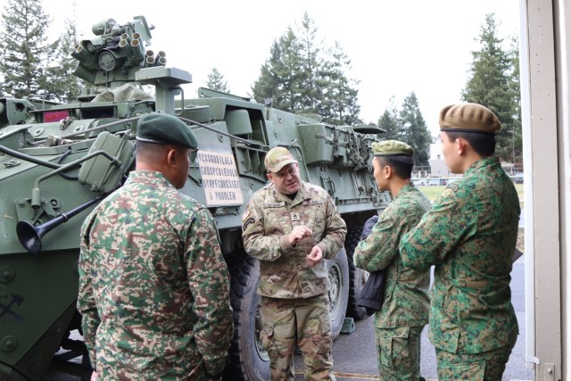 A Soldier from 7th Infantry Division talks to some of our allies and partners about the many capabilities of 7th ID during the Indo-Pacific Motorized Forum on Jan. 25-26, 2024. Allies, partners, and friends attended the 2nd annual IPMF to have...