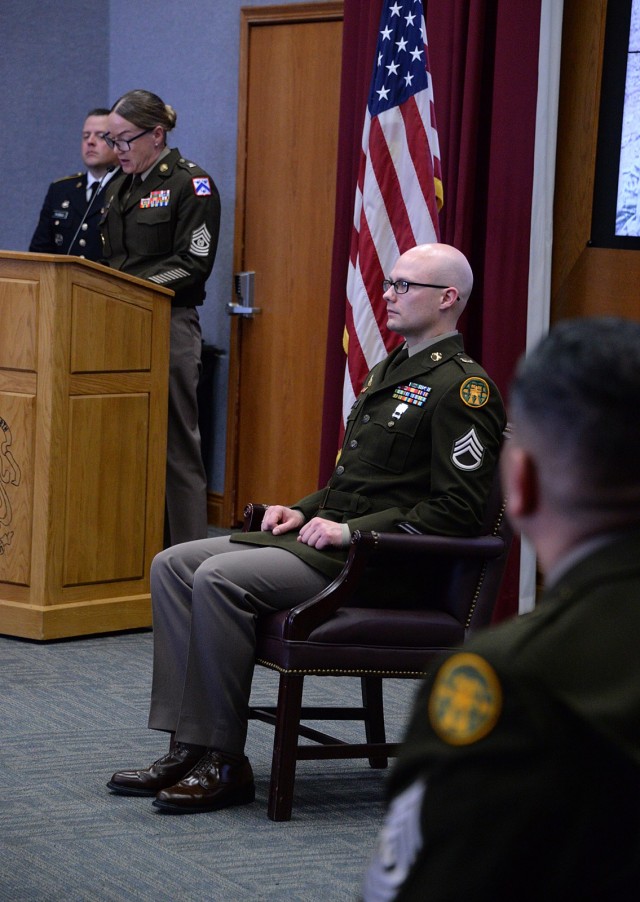Ceremony guest speaker Fort Leavenworth Garrison Command Sgt. Maj. Vanessa Sun delivers remarks during Staff Sgt. Quinlan Simpson's Sergeant Audie Murphy Club induction March 28, 2025, in Grant Auditorium at Fort Leavenworth, Kansas. Photo by...