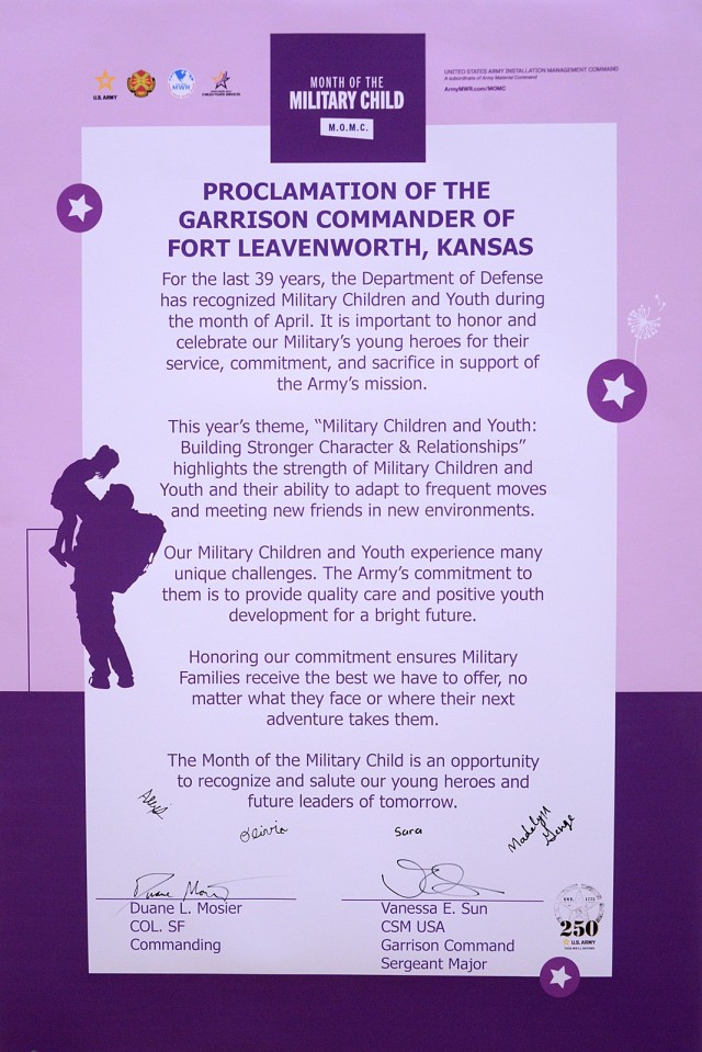 The Fort Leavenworth Garrison Command Team, Child and Youth Services staff members and military families kicked off Month of the Military Child April 1, 2025, with a proclamation signing ceremony at Harrold Youth Center at Fort Leavenworth, Kansas.