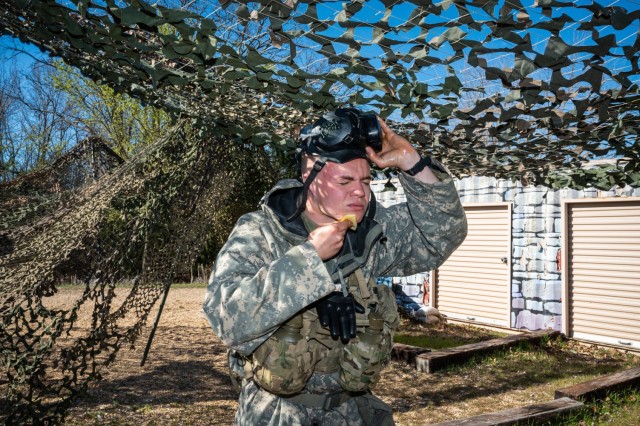 Pvt. Dorian Bautch, 1st Engineer Brigade squad member, decontaminates himself during a test of his ability to assume mission oriented protective posture, commonly called MOPP, during the Maneuver Support Center of Excellence 2025 Best Squad...