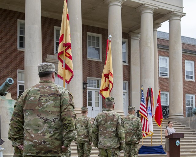 Fort Belvoir&#39;s command team and Headquarters Battalion stand in formation at Garrison Headquarters during a patching ceremony at Fort Belvoir, April 3. Following an executive order from the Secretary of the Army, Soldiers exchanged their Army...
