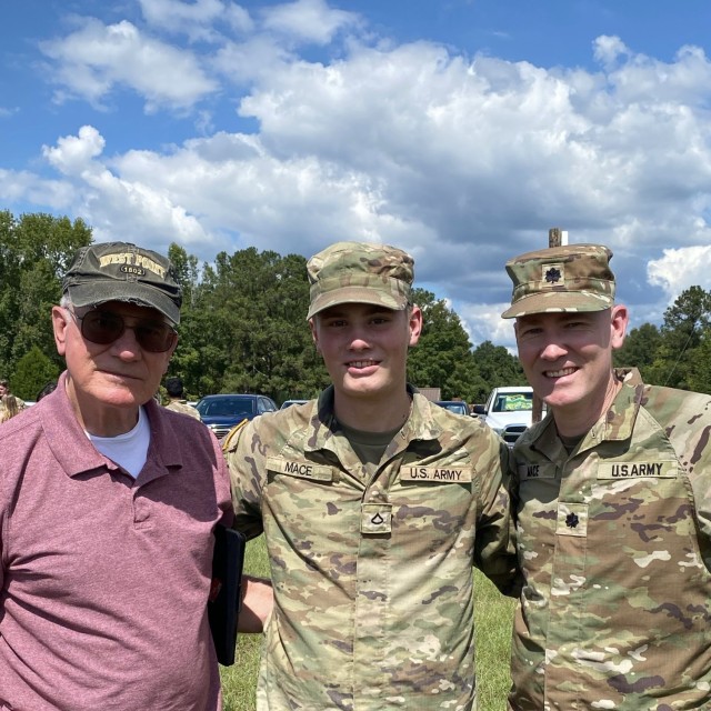 Three generations of the Mace family pose for a photo at Thor&#39;s basic training graduation in August 2024 at Fort Sill, Oklahoma.  From left to right is retired Lt. Cmdr. Robert Mace, Pfc. Thor Mace and Lt. Col. Brandon Mace.
