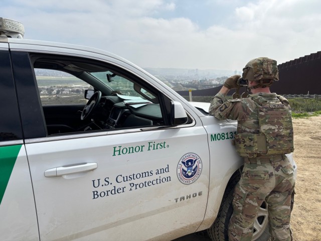A U.S. Soldier, assigned to the 716th Military Police Battalion, 89th Military Police Brigade, provides overwatch from an elevated position supporting detection and monitoring operations along the southern border near San Diego, California, March...