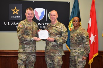 Contracting Soldiers Receive Master Combat Badge
